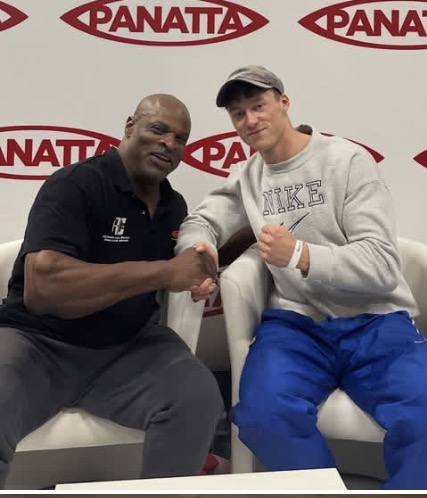 Ich beim Händeschütteln mit Ronnie Coleman